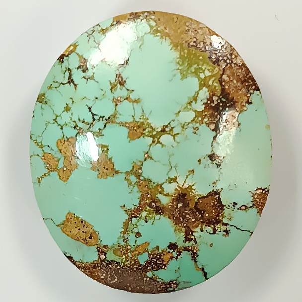 فیروزه نیشابور طبیعی اووال آبی آسمانی سیر AA به وزن 3.6 گرم